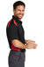 CornerStone CS416 Mens Select Moisture Wicking Short Sleeve Polo Shirt w/ Pocket Black/Red Model Side