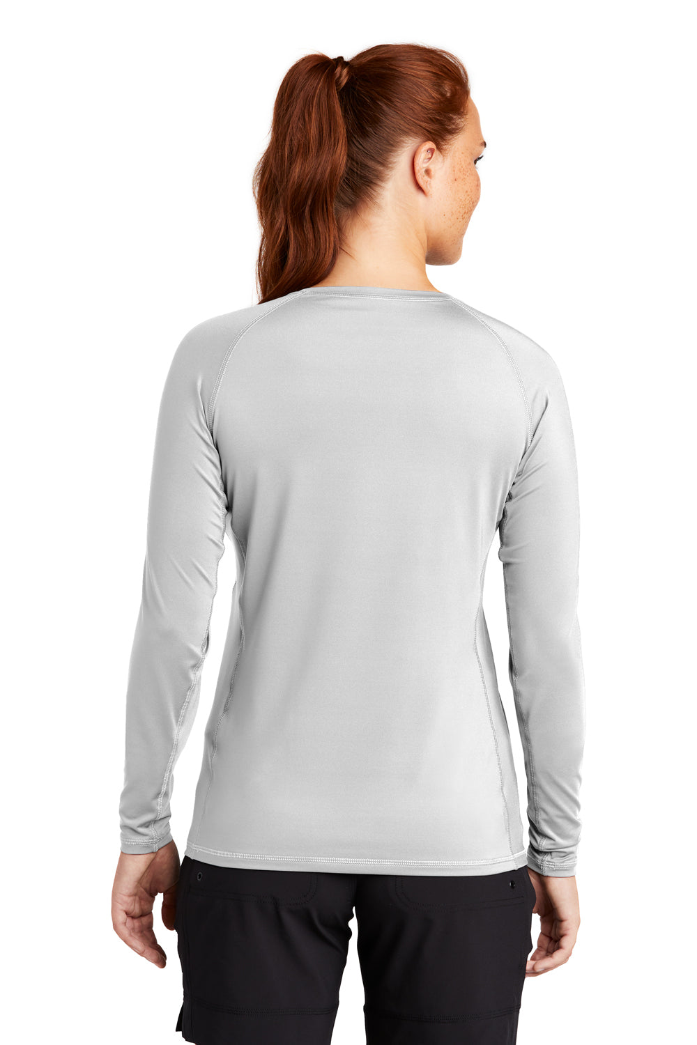 Sport-Tek LST470LS Womens Rashguard Moisture Wicking Long Sleeve Crewneck T-Shirt White Model Back