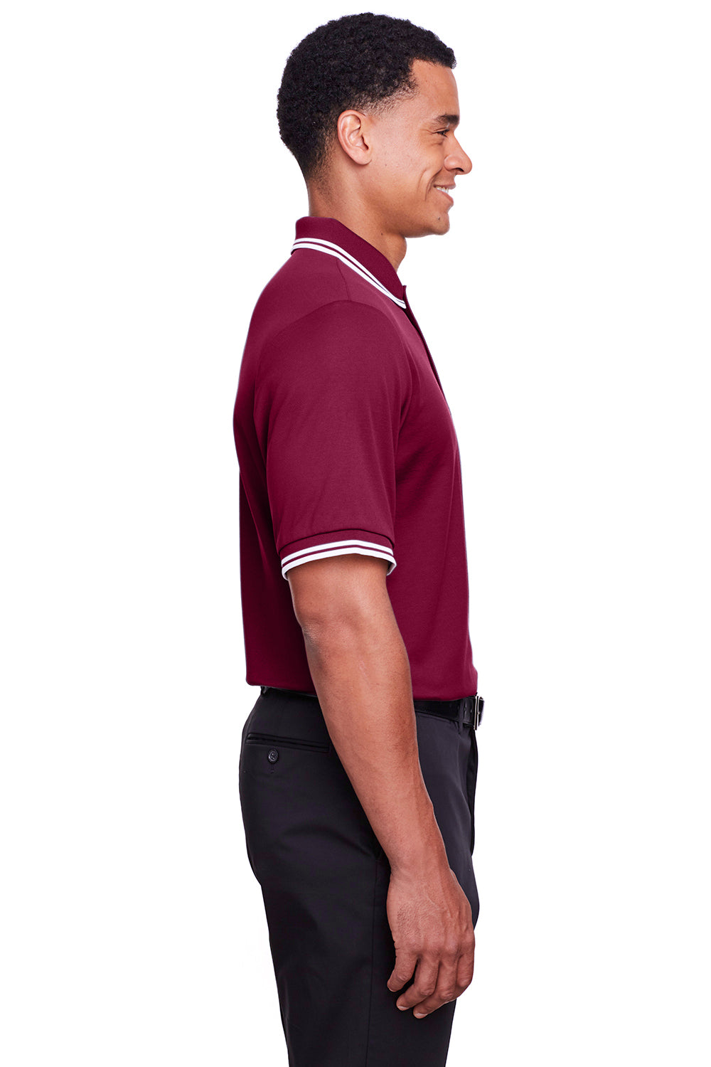 Devon & Jones DG20C Mens CrownLux Performance Moisture Wicking Short Sleeve Polo Shirt Burgundy/White Model Side